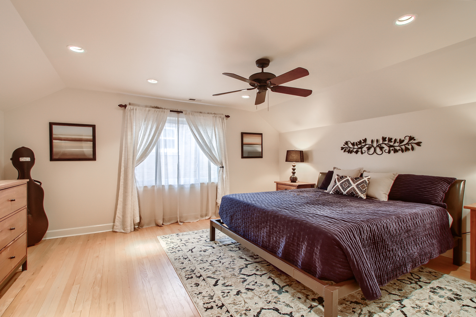 50 Northgate Road Riverside, IL 60546 - Photo 16 of 33 a bedroom with a bed a window and a chandelier