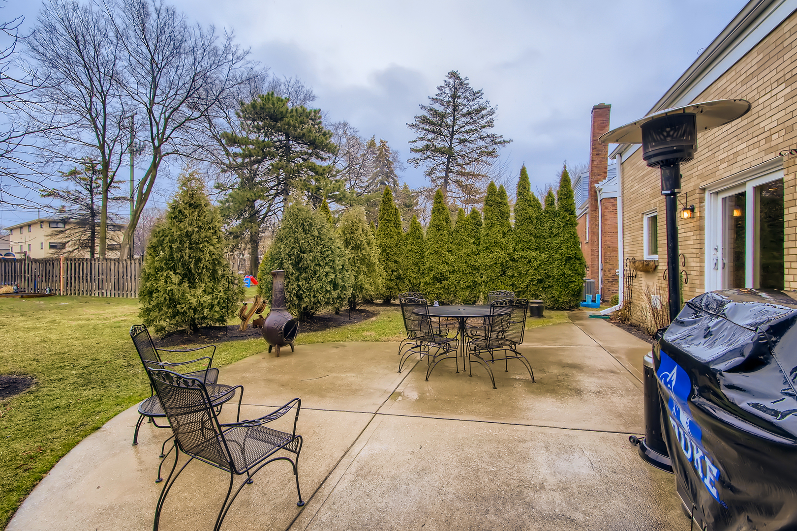 50 Northgate Road Riverside, IL 60546 - Photo 24 of 33 a view of a patio with table and chairs and potted plants