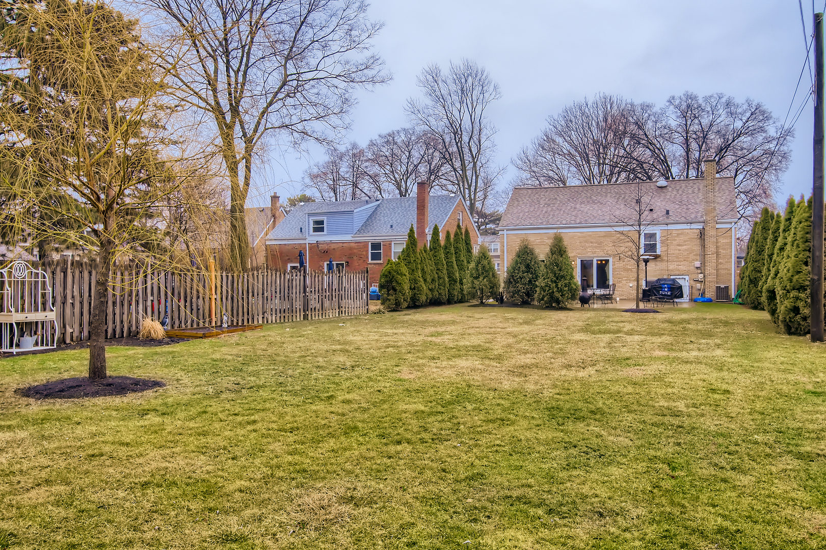 50 Northgate Road Riverside, IL 60546 - Photo 27 of 33 a swimming pool with outdoor seating and yard