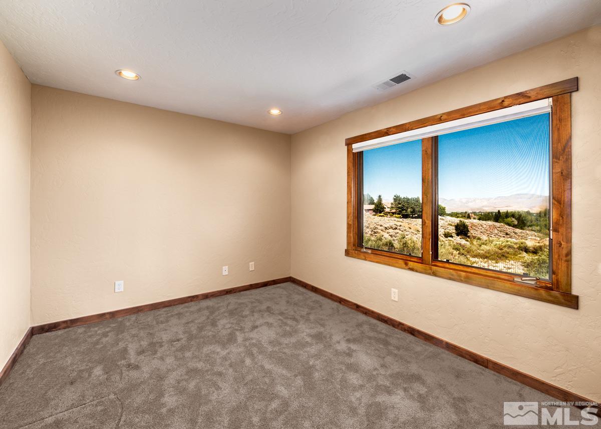 4145 Lone Tree Lane Reno, NV 89511 - Photo 21 of 37 an empty room with a window