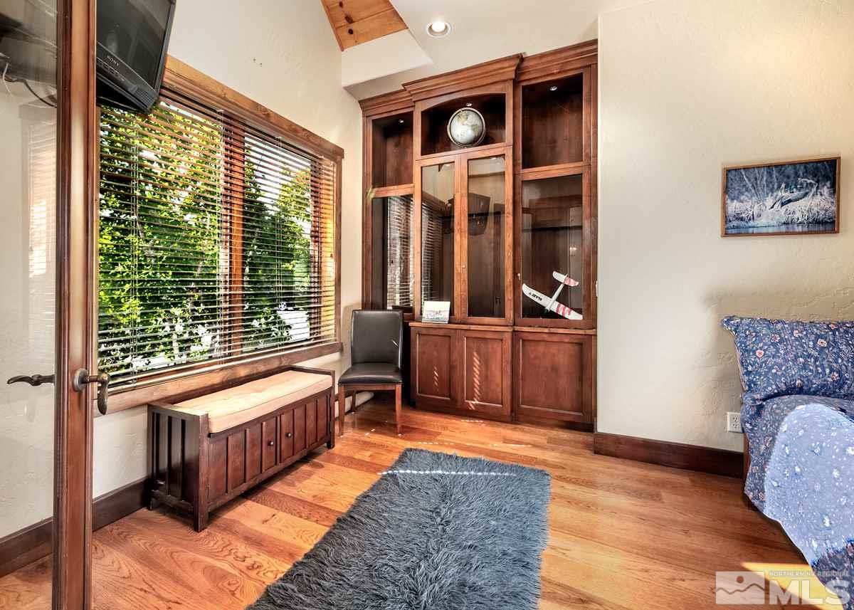 4145 Lone Tree Lane Reno, NV 89511 - Photo 23 of 37 a bedroom with furniture and a window