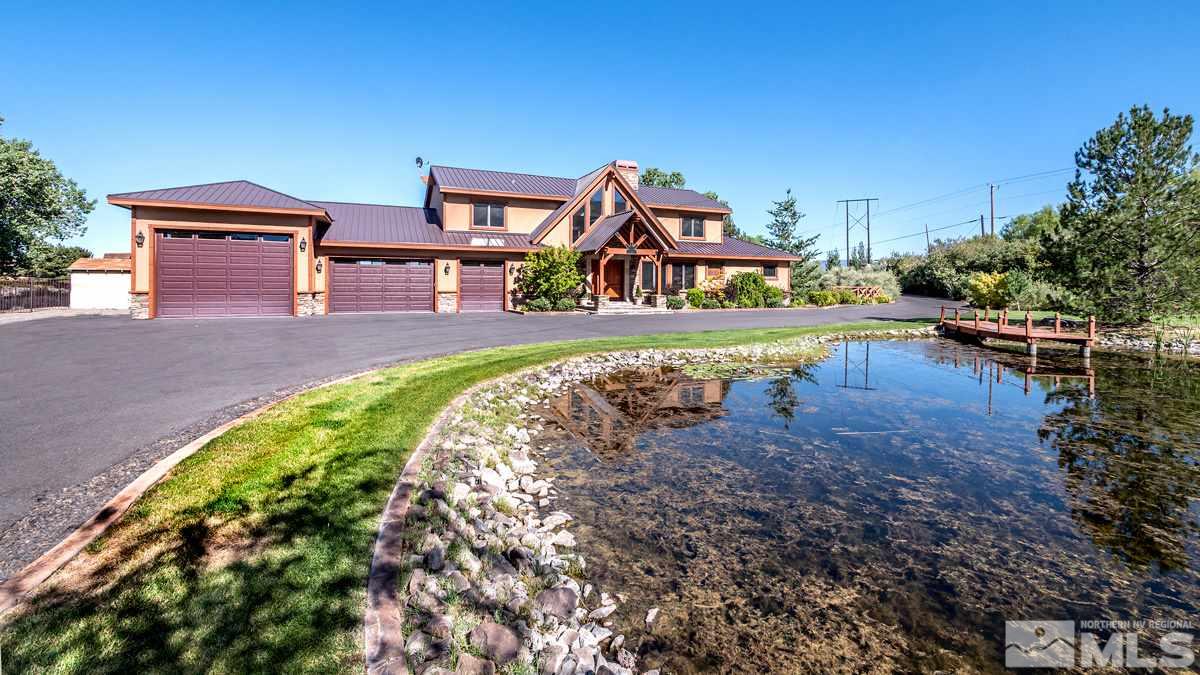 4145 Lone Tree Lane Reno, NV 89511 - Photo 31 of 37 a view of a swimming pool with a yard