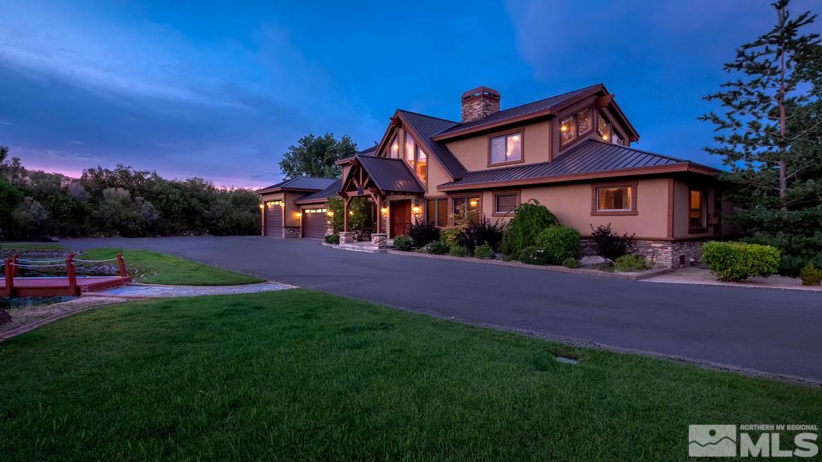4145 Lone Tree Lane Reno, NV 89511 - Photo 35 of 37 a view of a house with a yard