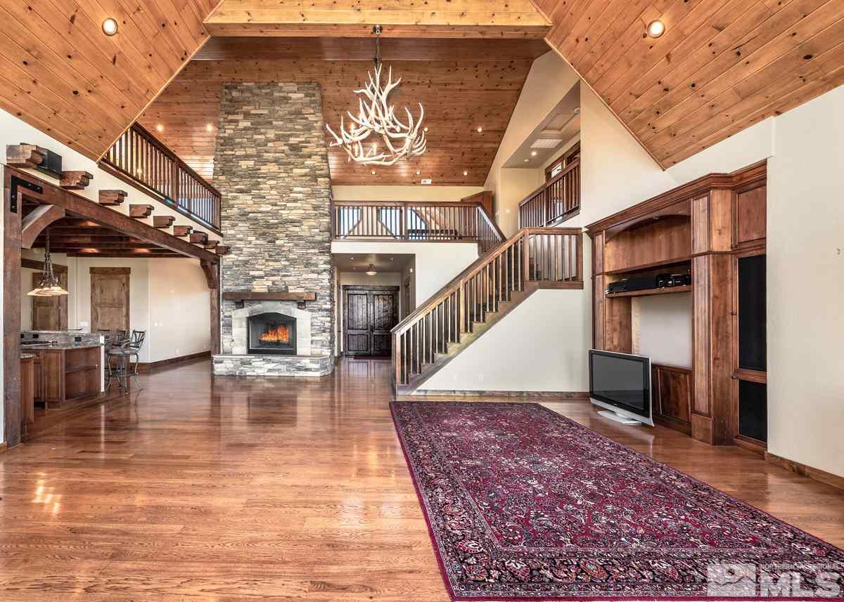 4145 Lone Tree Lane Reno, NV 89511 - Photo 6 of 37 a view of entryway and hall with wooden floor