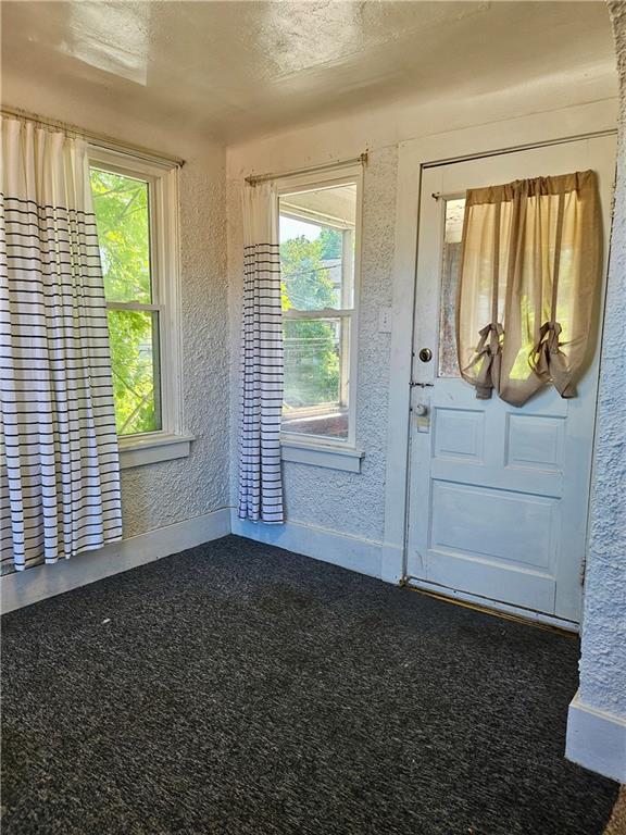 627 5th Avenue, Unit 2 Coraopolis, PA 15108 - Photo 11 of 22 an empty room with windows