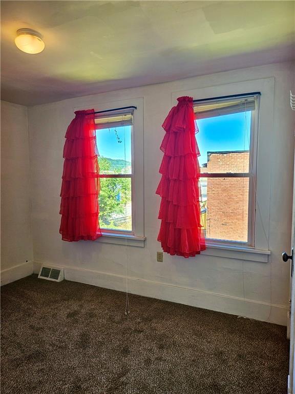 627 5th Avenue, Unit 2 Coraopolis, PA 15108 - Photo 12 of 22 a room with a window and bed
