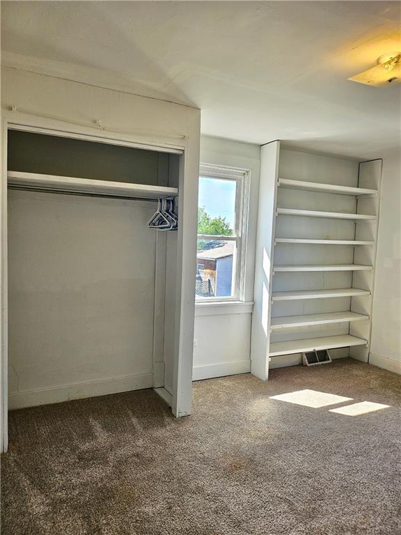 627 5th Avenue, Unit 2 Coraopolis, PA 15108 - Photo 17 of 22 a view of room with closet and empty racks