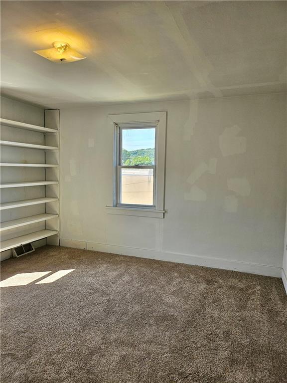 627 5th Avenue, Unit 2 Coraopolis, PA 15108 - Photo 18 of 22 a view of an empty room with a window