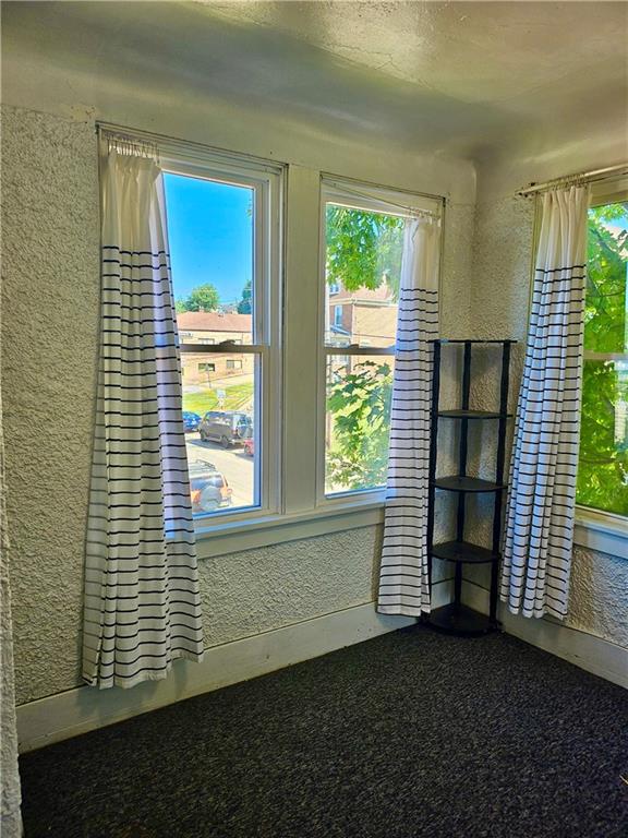 627 5th Avenue, Unit 2 Coraopolis, PA 15108 - Photo 10 of 22 a view of wooden floor and windows in a room