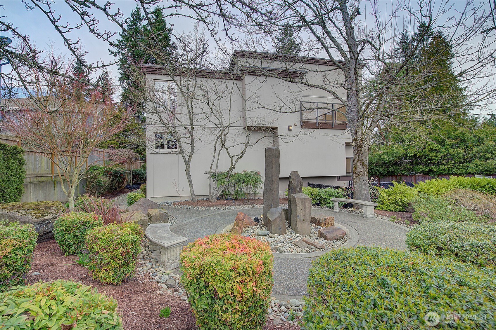 8503 Bowdoin Way, Unit 203 Edmonds, WA 98026 - Photo 1 of 19 a view of a chair and table in the garden