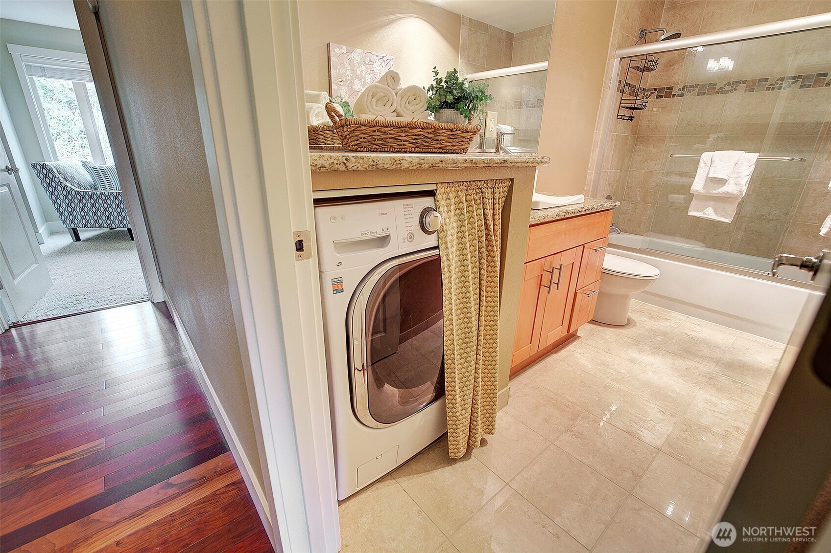 8503 Bowdoin Way, Unit 203 Edmonds, WA 98026 - Photo 17 of 19 a view of a hallway with washer and dryer