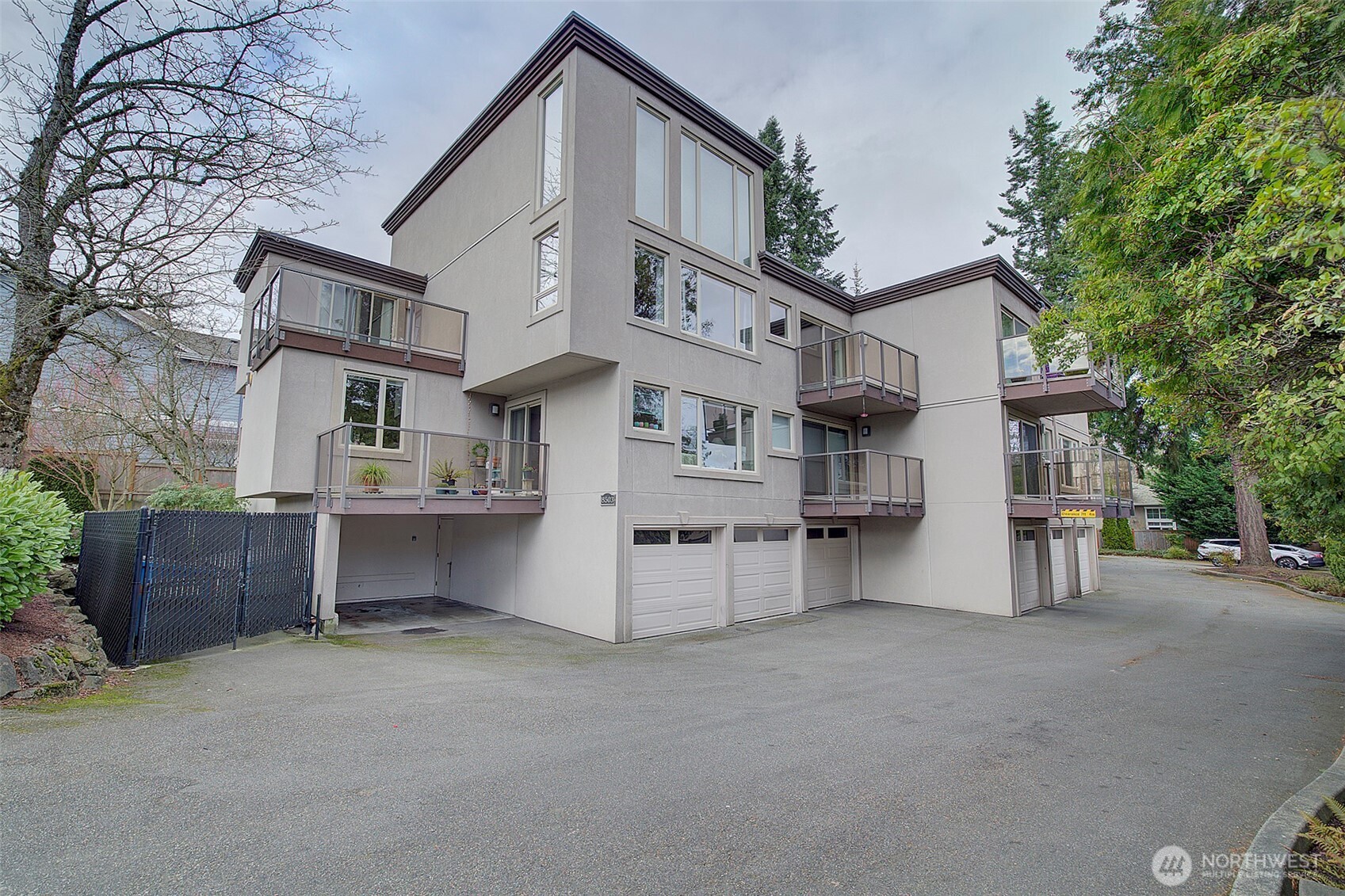 8503 Bowdoin Way, Unit 203 Edmonds, WA 98026 - Photo 2 of 19 a view of a house with a back yard