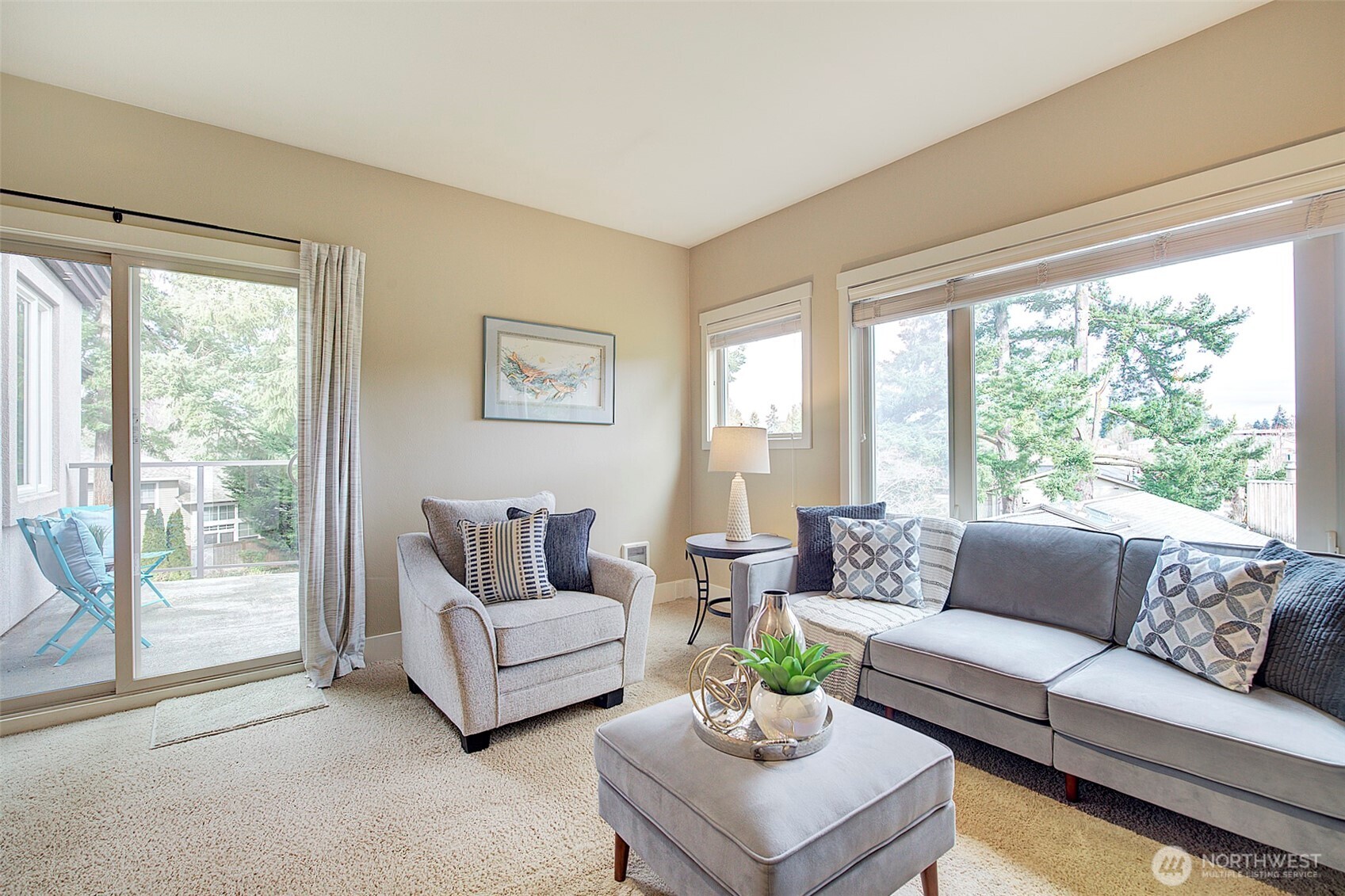 8503 Bowdoin Way, Unit 203 Edmonds, WA 98026 - Photo 5 of 19 a living room with furniture and a large window