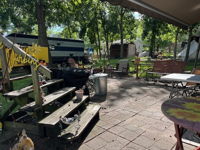 2795 East 28th Road Marseilles, IL 61341 - Photo 6 of 50 a view of a chairs and table in the patio