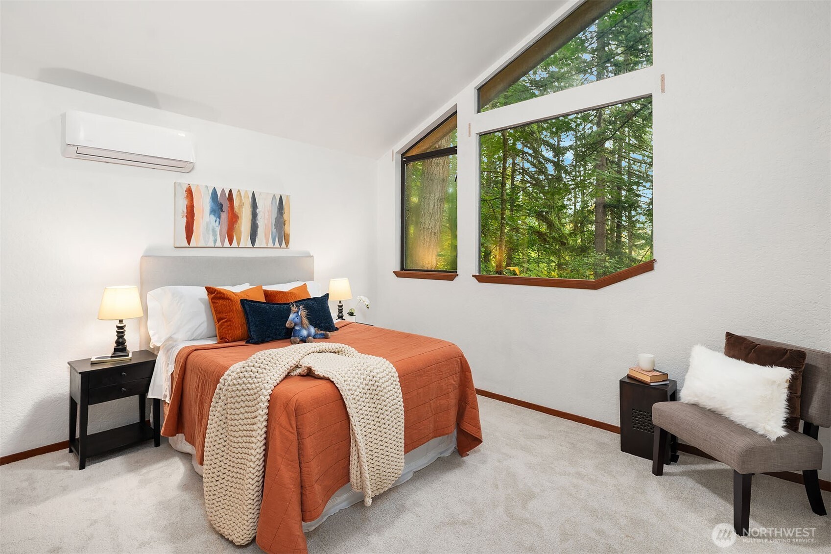 25156 Southeast 158th Street Issaquah, WA 98027 - Photo 20 of 30 a bedroom with a bed and a painting on the wall