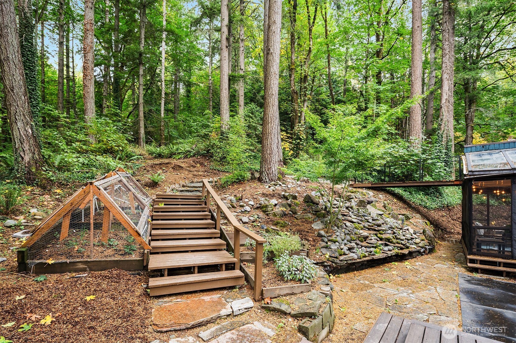25156 Southeast 158th Street Issaquah, WA 98027 - Photo 24 of 30 a view of a chairs and tables in the backyard