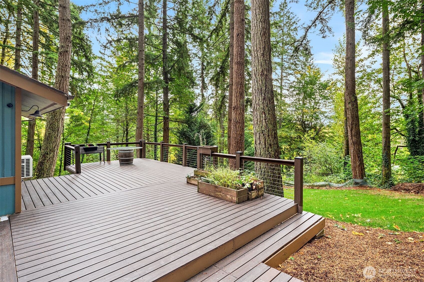 25156 Southeast 158th Street Issaquah, WA 98027 - Photo 26 of 30 a view of a table and chairs on the roof deck