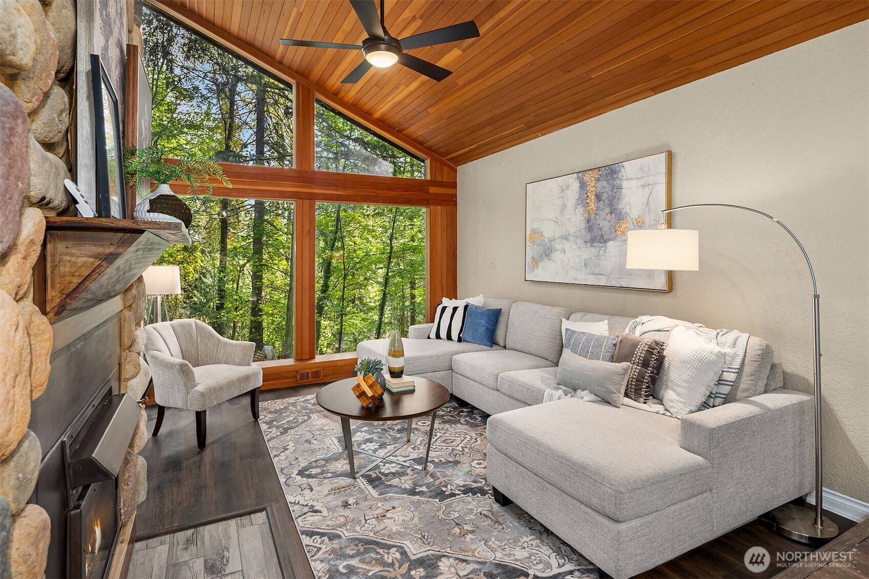 25156 Southeast 158th Street Issaquah, WA 98027 - Photo 4 of 30 a living room with furniture and a large window