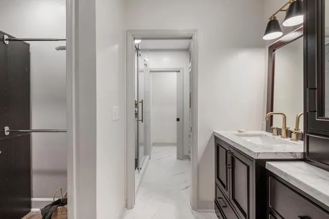 a bathroom with a bathtub and shower