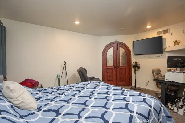 a bathroom with a shower and a toilet