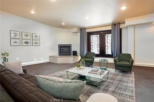 a kitchen with stainless steel appliances granite countertop a stove a refrigerator and a sink