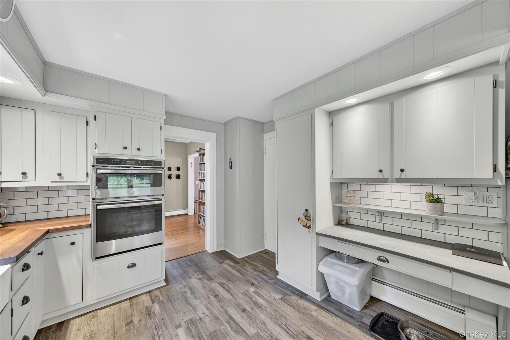 10 Edwin Road Poughkeepsie, NY 12603 - Photo 14 of 46 a kitchen with granite countertop white cabinets and white appliances