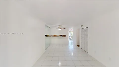 a view of a hallway with a furniture