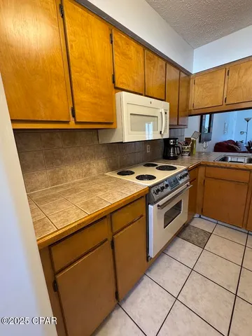 $189,000 | 7125 North Lagoon Drive, Unit H, Panama City, FL 32408