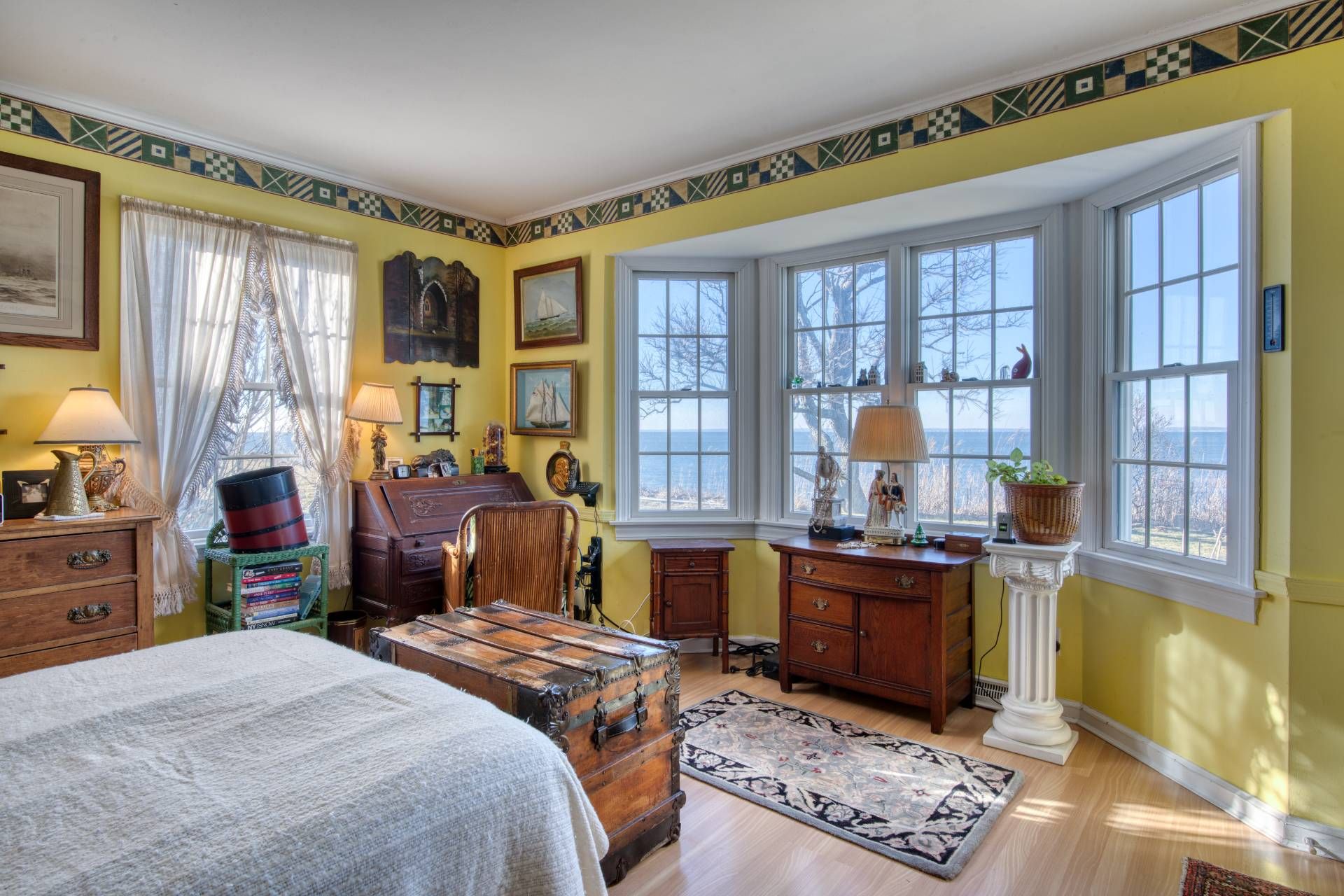 335 Sound View Road Orient, NY 11957 - Photo 17 of 22 a bed room with a bed and a window