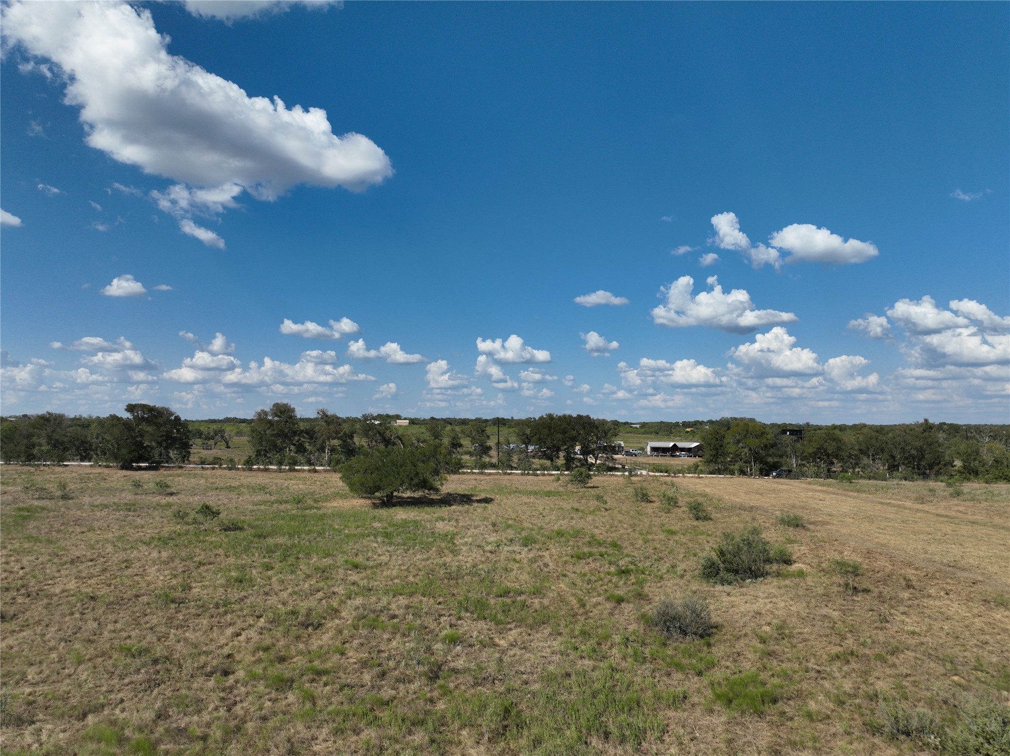 Tbd Lot 6 Tbd Road Dale, TX 78616 - Photo 2 of 11 a view of a lake