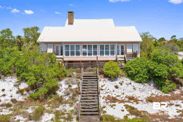 30234 River Road Orange Beach, AL 36561 - Photo 2 of 23 This home is on high elevation overlooking Old River and situated on .79 acres.