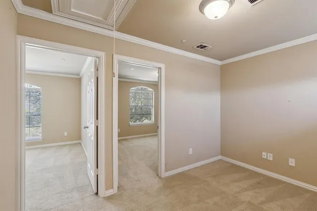 an empty room with mirror