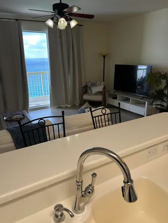 a room with furniture and a large window
