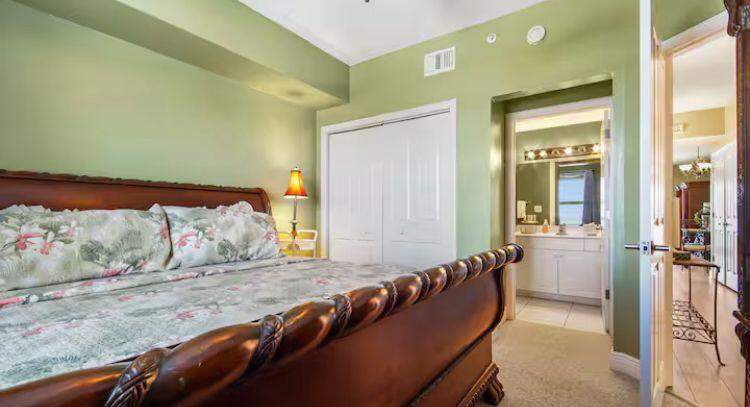 17757 Front Beach Road, Unit 2204D Panama City Beach, FL 32413 - Photo 19 of 32 a room with furniture and a large window