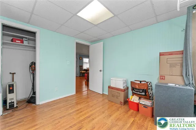 a workspace with furniture and wooden floor