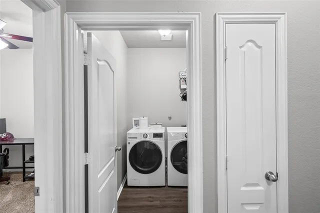 a utility room with dryer and washer