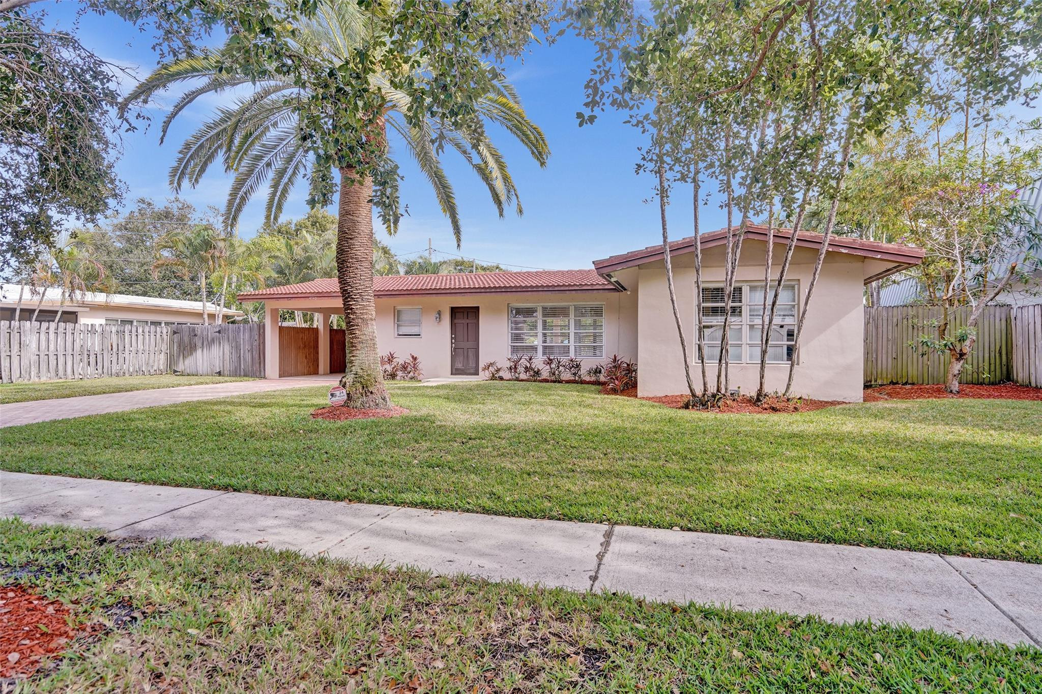 4740 Northeast 21st Terrace Lighthouse Point, FL 33064 - Photo 1 of 28 Beautiful curb appeal