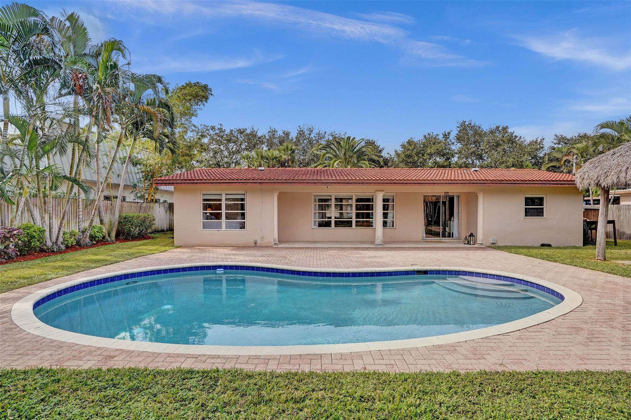4740 Northeast 21st Terrace Lighthouse Point, FL 33064 - Photo 17 of 28 Beautiful pool and pavers