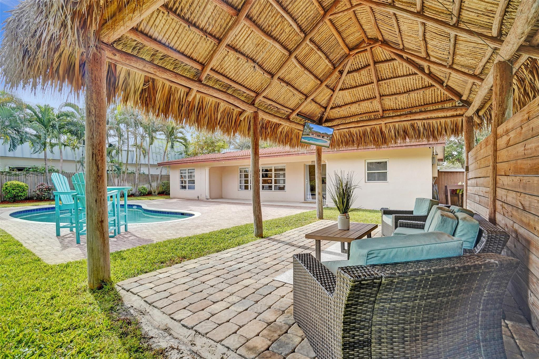 4740 Northeast 21st Terrace Lighthouse Point, FL 33064 - Photo 18 of 28 Tiki Hut with Brick Paver Decking