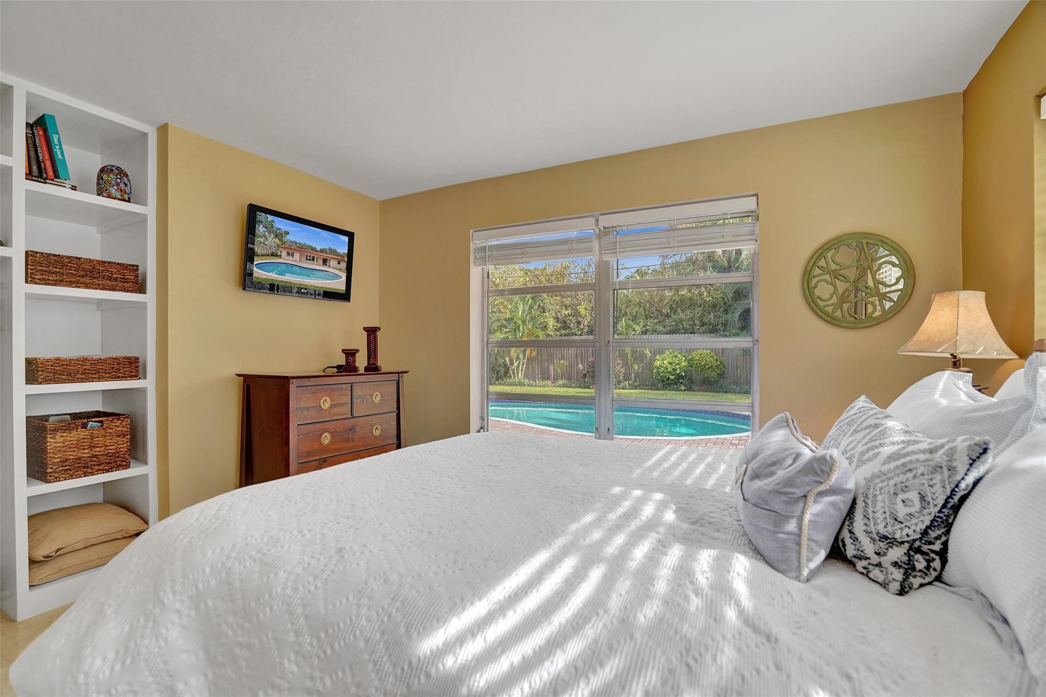 4740 Northeast 21st Terrace Lighthouse Point, FL 33064 - Photo 10 of 28 Primary Bedroom overlooking pool