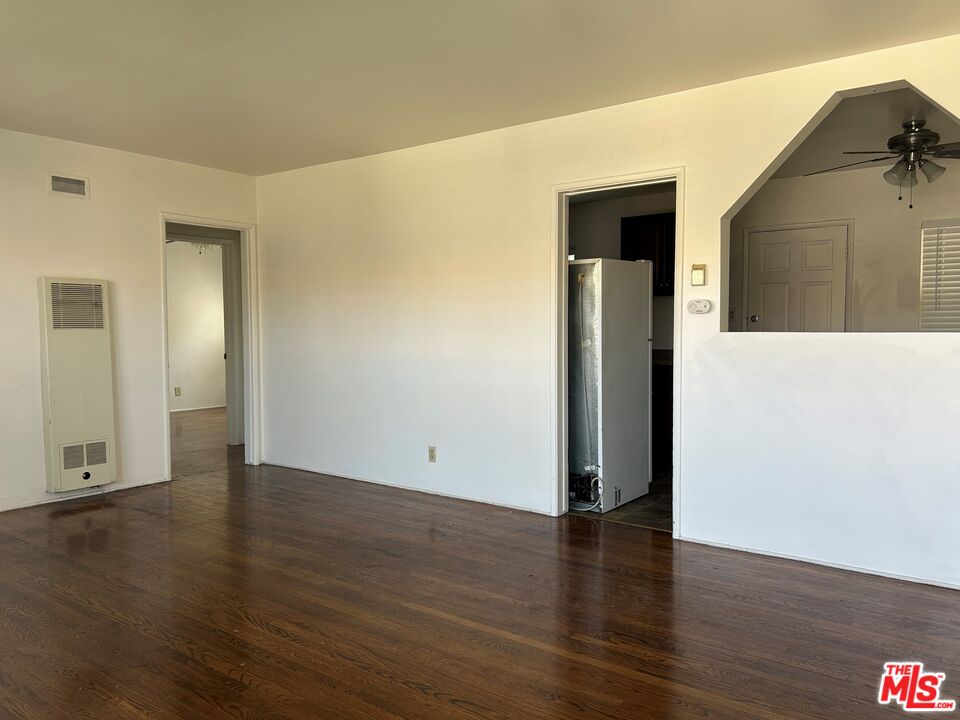 4107 Wade Street, Unit H Los Angeles, CA 90066 - Photo 2 of 16 an empty room with wooden floor and closet