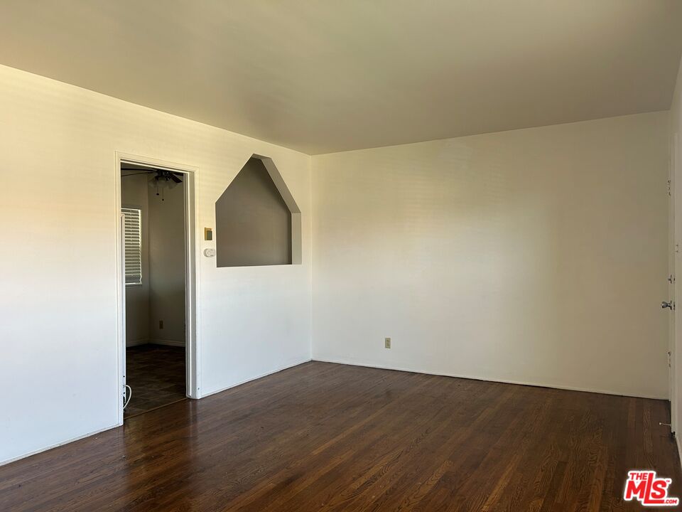 4107 Wade Street, Unit H Los Angeles, CA 90066 - Photo 3 of 16 an empty room with wooden floor and closet