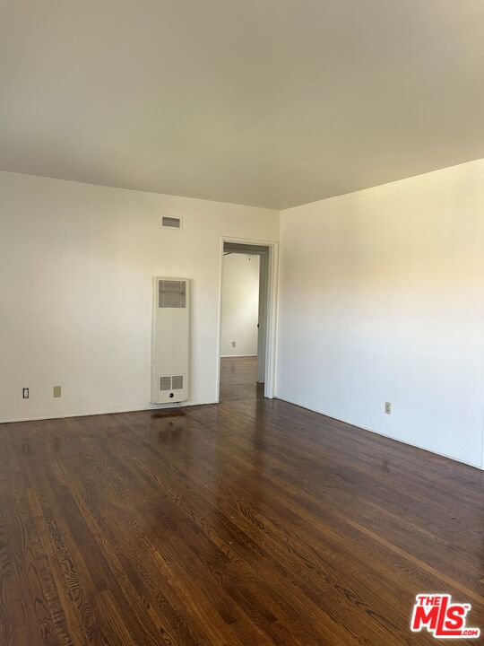 4107 Wade Street, Unit H Los Angeles, CA 90066 - Photo 8 of 16 a view of an empty room and wooden floor
