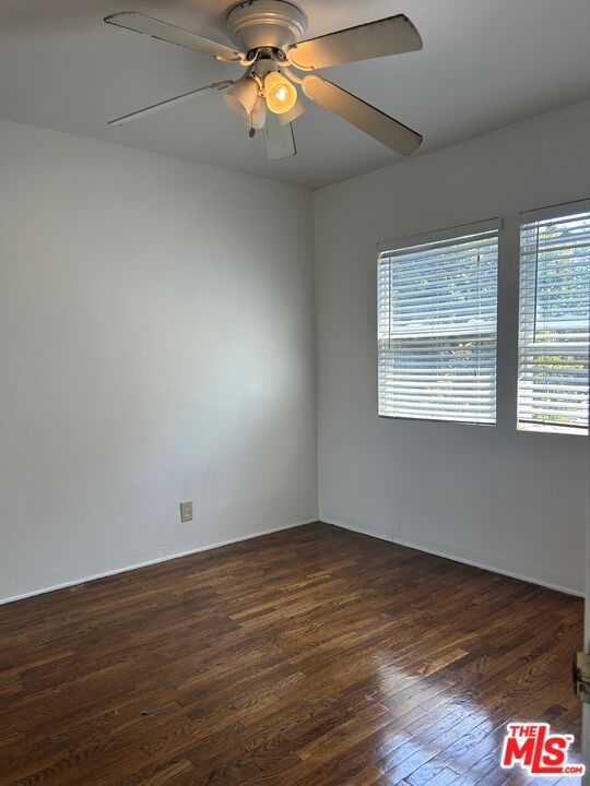 4107 Wade Street, Unit H Los Angeles, CA 90066 - Photo 9 of 16 a view of an empty room with window and wooden floor