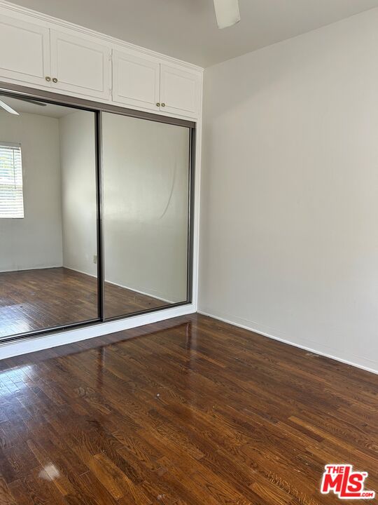 4107 Wade Street, Unit H Los Angeles, CA 90066 - Photo 10 of 16 a view of an empty room with wooden floor
