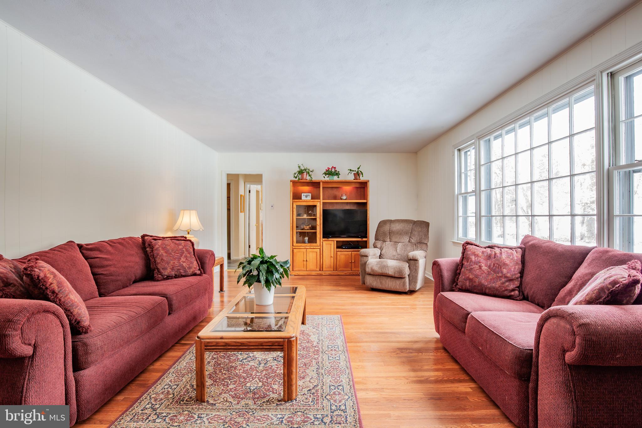 771 Richards Road Wayne, PA 19087 - Photo 12 of 41 a living room with furniture or couch and a large window