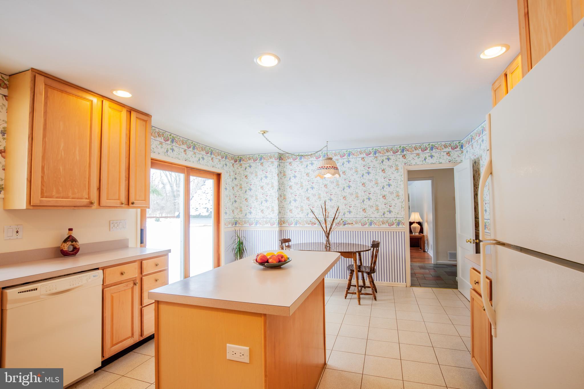 771 Richards Road Wayne, PA 19087 - Photo 19 of 41 a kitchen that has a cabinets and a table in it