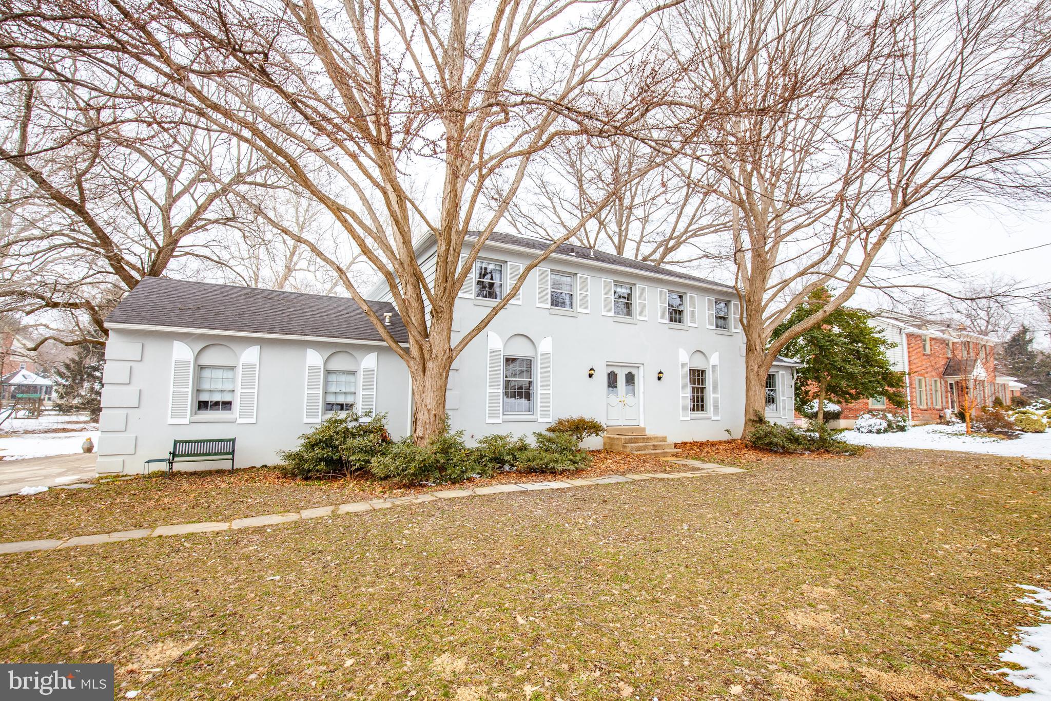 771 Richards Road Wayne, PA 19087 - Photo 2 of 41 a large white house with a large tree in front of it