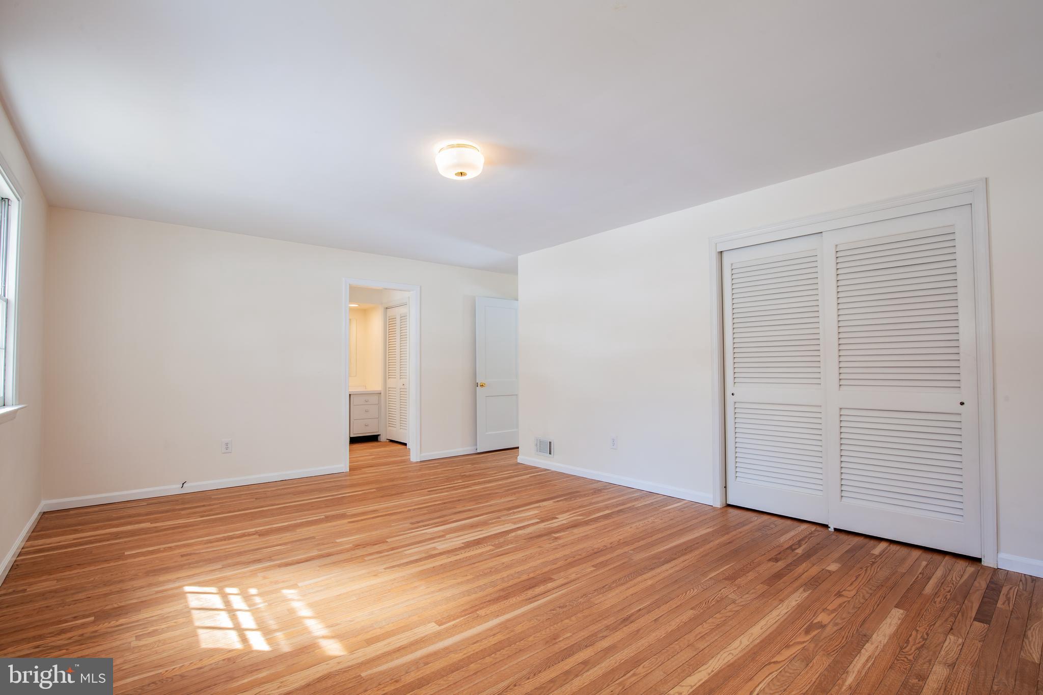 771 Richards Road Wayne, PA 19087 - Photo 21 of 41 a view of empty room with wooden floor