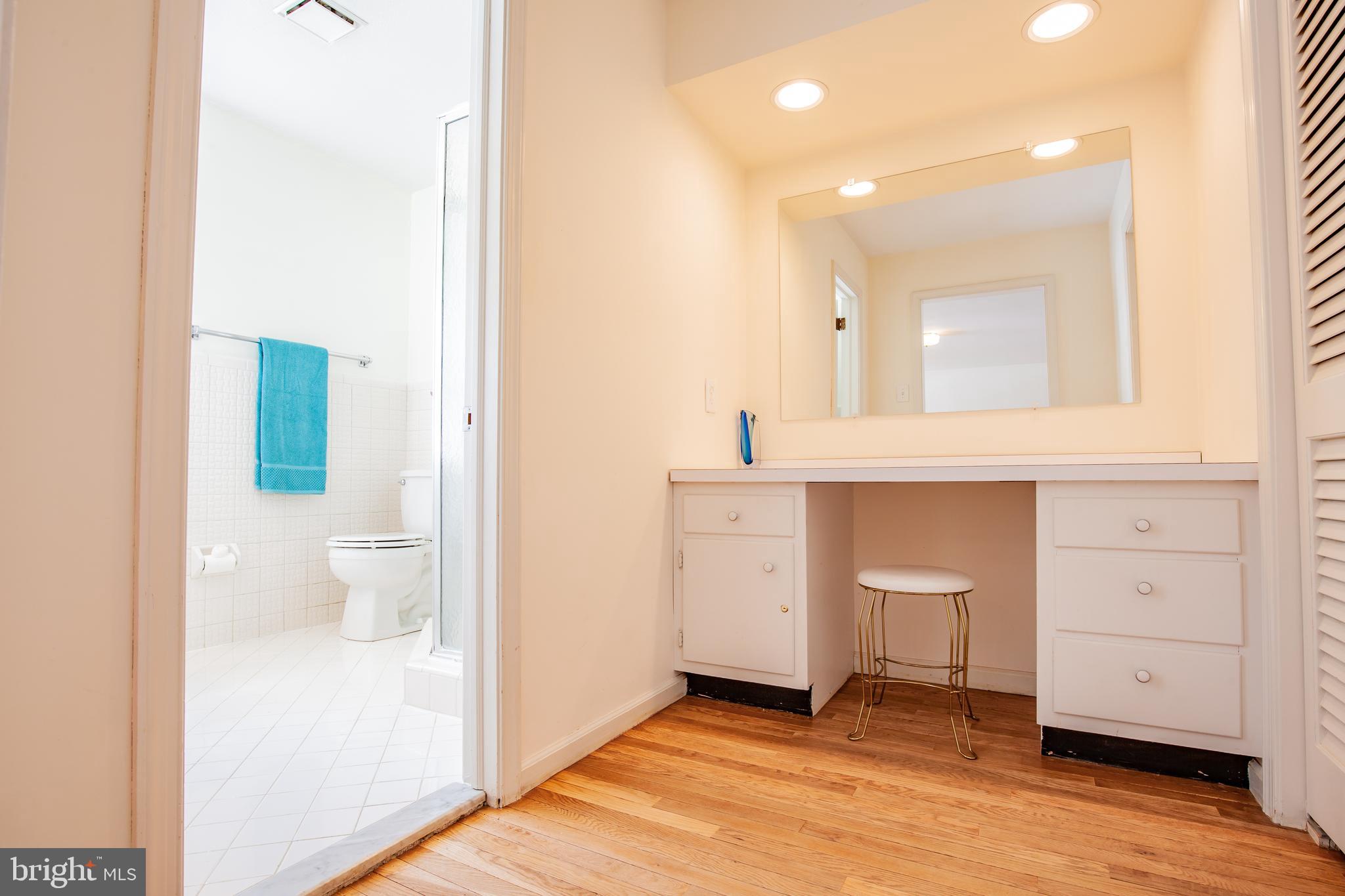 771 Richards Road Wayne, PA 19087 - Photo 24 of 41 a bathroom with a sink a toilet and a mirror